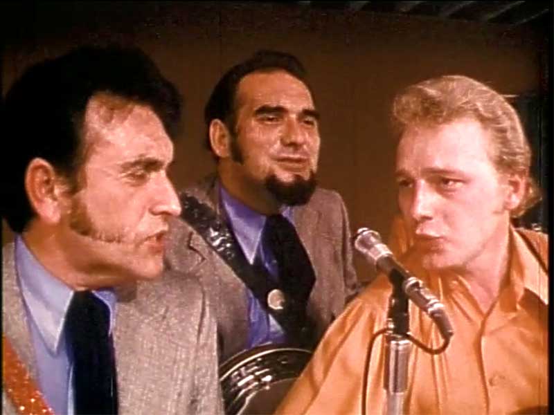 Bluegrass Country Soul still frame showing banjo player and bandmates onstage