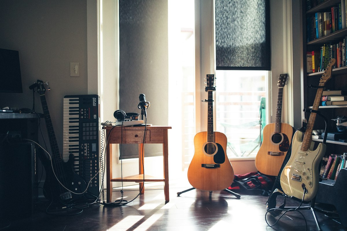 Bluegrass musicians rehearsing together with acoustic instruments
